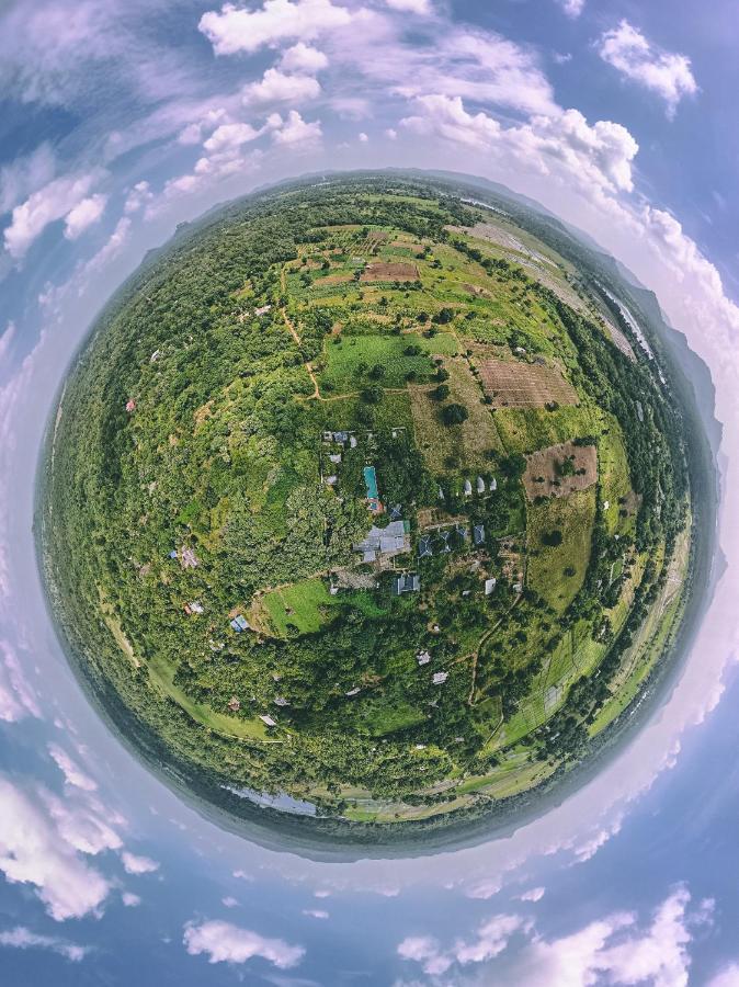 Nivadoo Resort Sigiriya Dış mekan fotoğraf Aerial view of the village